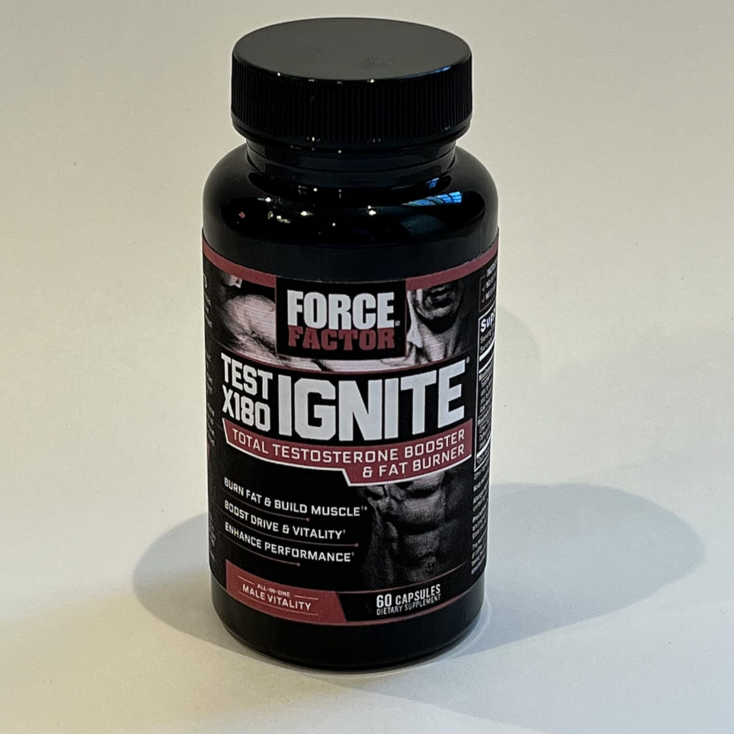Force Factor Test X180 Ignite supplement bottle on a light background