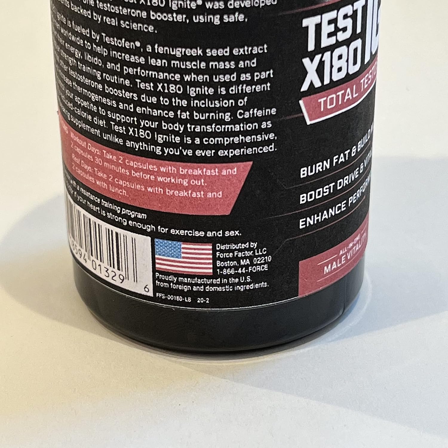 Close-up of a supplement bottle label for Test X180 Ignite on a white background